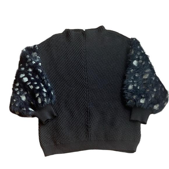 Anthropologie Sweaters - Knitted & Knotted Black Sweater with Patterned Sleeves - SP